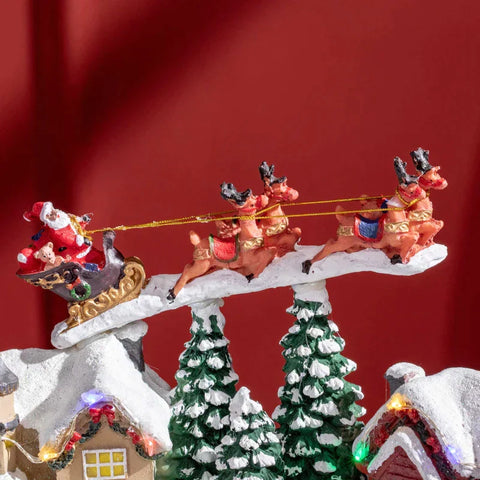 Rootz Christmas Village - Little Christmas Village - Snowy Village - Christmas Decoration - 13 Colorful LEDs - Moving Ice Skaters - Multicolor - 30 x 24.5 x 23cm